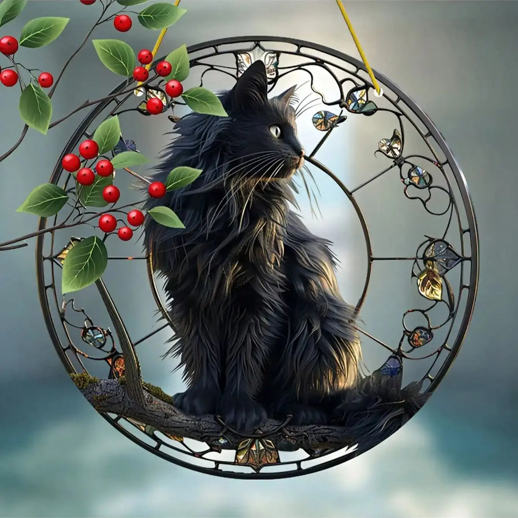 Black cat pendant sitting on a tree branch basking in the sun