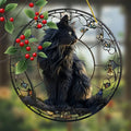 Black cat pendant sitting on a tree branch basking in the sun
